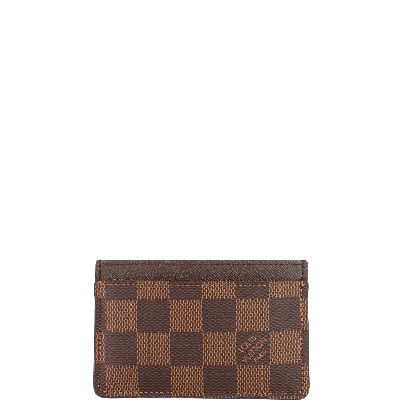 Louis Vuitton Twist bags with a crystal - embellished LV - turnlockDamier Ebene Canvas Card Holder