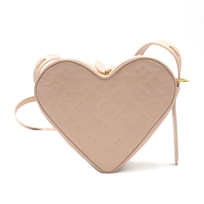 Louis Vuitton bags with a detachable mobile phone holder for convenienceLouis Vuitton Sac Cool Foreign Love Heart Box Pink Metallic pink leather M58738